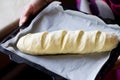 Formed yeast dough for long loaf bread with scores